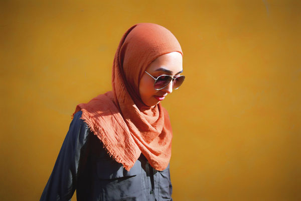 woman wearing hijab and sunglasses