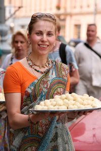 A Russian Hare Krishna with a plate of “prasadam,” or “food sanctified by the Lord.”