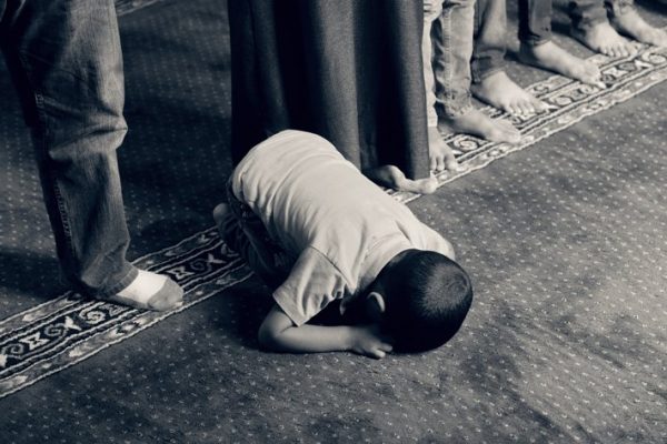 A child prays.