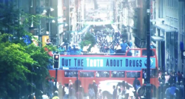 Double-decker bus with “Truth About Drugs” banner: What is Scientology? Super Bowl Ad 2018