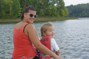 Our daughter and our au pair out on a canoe ride.