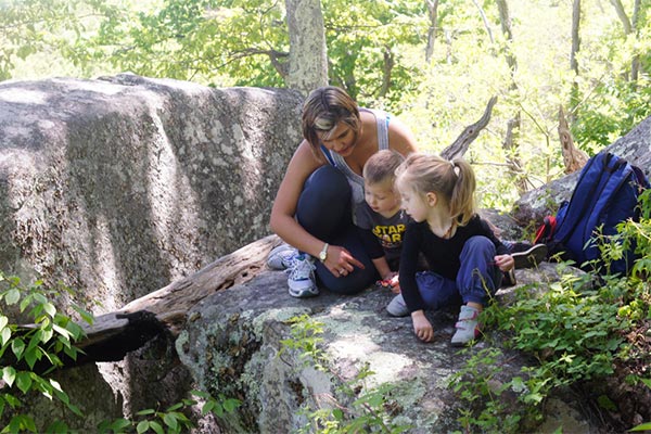 Our au pair spending some nature time with the kids on the Appalachian Trail.