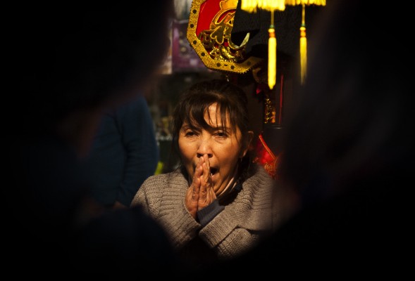 Chinese Woman Praying