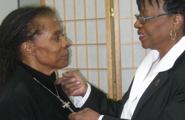 Verlene Cheeseboro, (left), in a 2012 photograph of her Scientology ordainment ceremony.