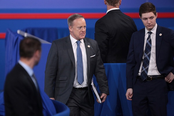 Spicer Walking with Colleagues