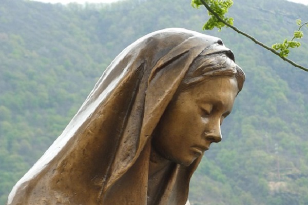 Behind the Weeping Virgin Mary
