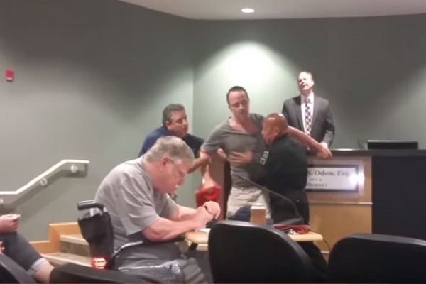 Satanist Charged for Trespassing and Resisting Arresting After Prayer Protest at Government Meeting
