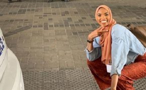 Muslim Woman Smiles in the Face of Bigotry