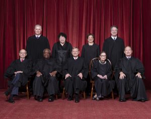 The Roberts Court, November 30, 2018. Seated, from left to right: Justices Stephen G. Breyer and Clarence Thomas, Chief Justice John G. Roberts, Jr., and Justices Ruth Bader Ginsburg and Samuel A. Alito. Standing, from left to right: Justices Neil M. Gorsuch, Sonia Sotomayor, Elena Kagan, and Brett M. Kavanaugh. Photograph by Fred Schilling, Supreme Court Curator's Office.