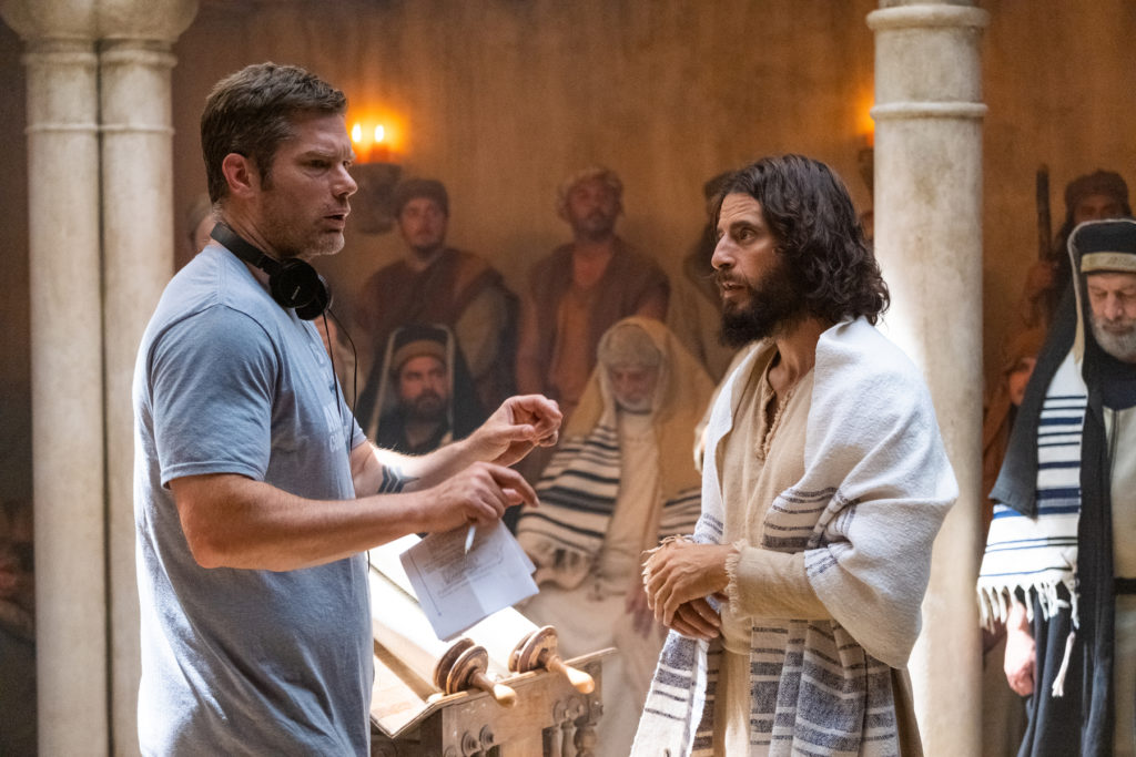 The Chosen - S3 BTS still - Director Dallas Jenkins and Jesus discuss scene in synagogue