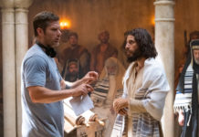 The Chosen - S3 BTS still - Director Dallas Jenkins and Jesus discuss scene in synagogue