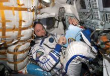 Astronaut Jeffrey Williams inside the Soyuz TMA-8 spacecraft