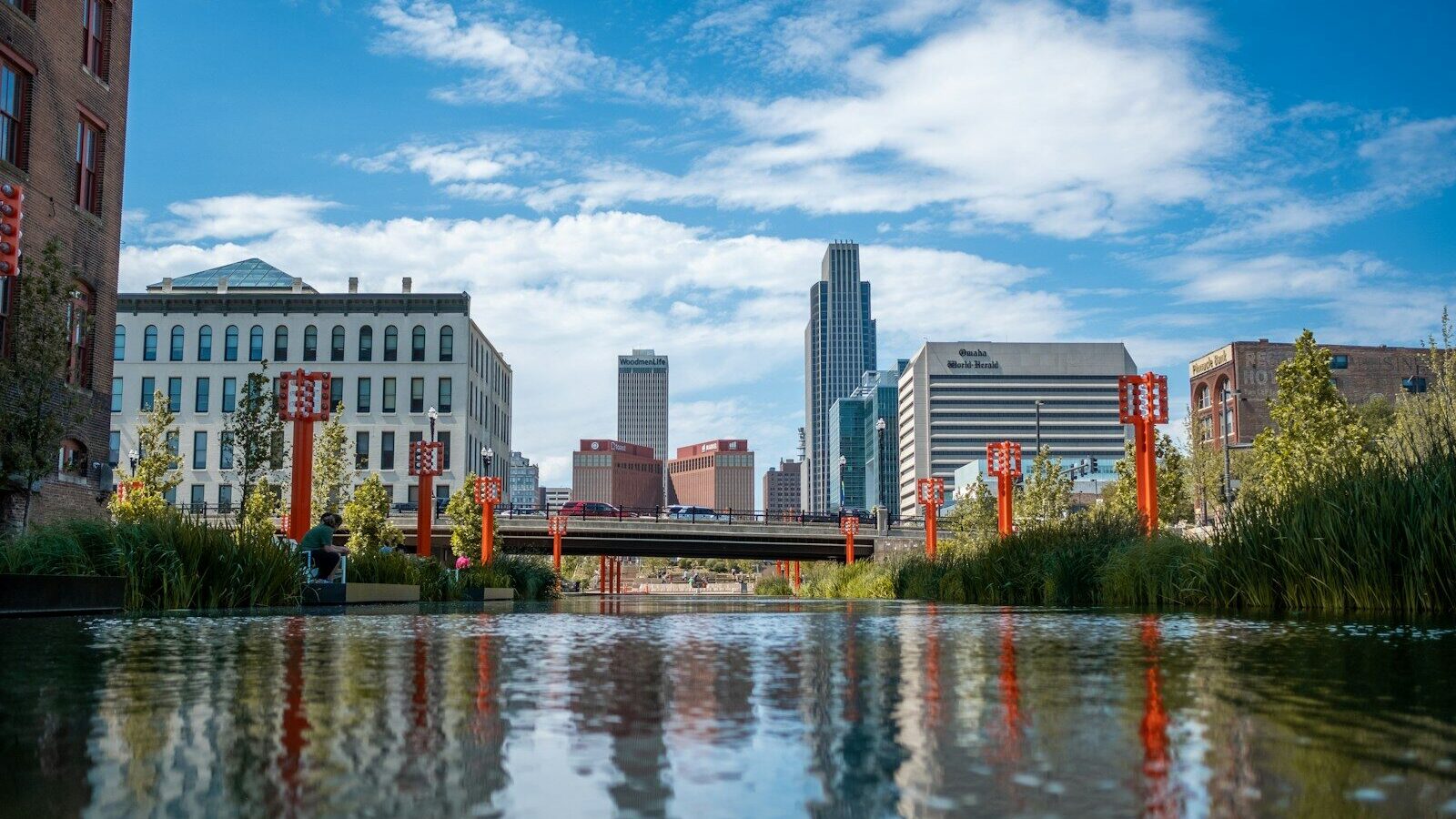 a body of water surrounded by tall buildings